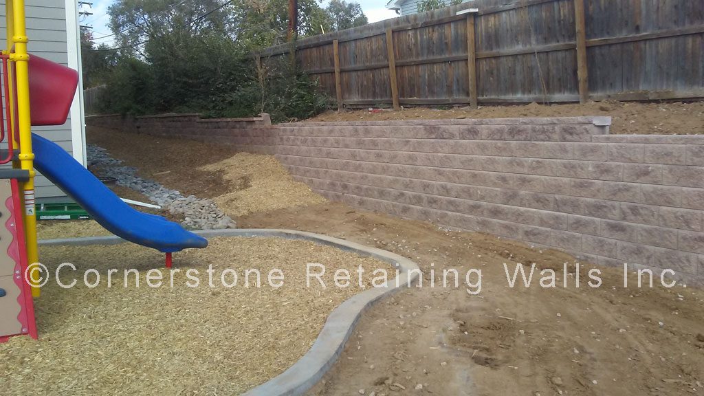 Allan Block tan blend retaining wall built with Classic block.