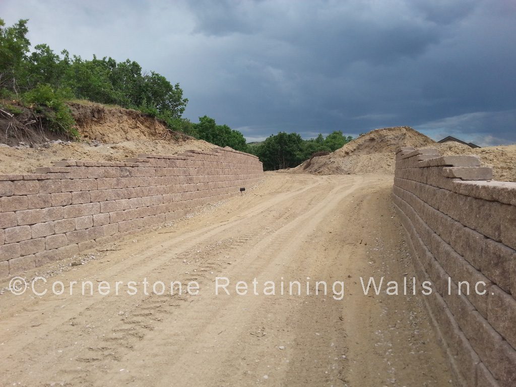 Retaining wall built with Allan Block Europa Dovers, tan blend.